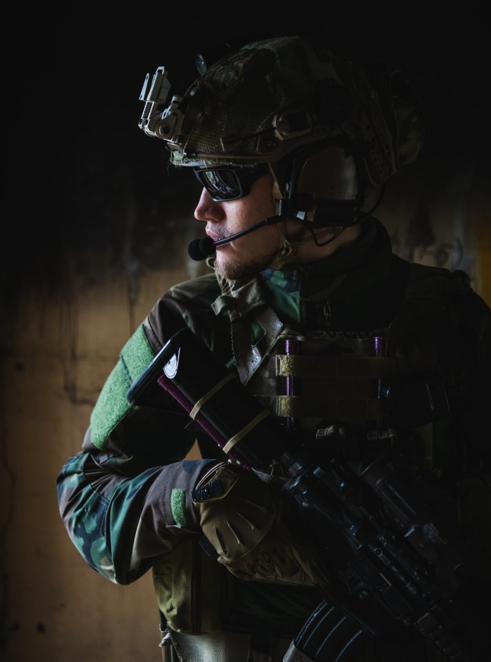 front-view-close-up-of-caucasian-soldier-with-a-rifle-stand-guard-securing-territory-looking-around.jpg